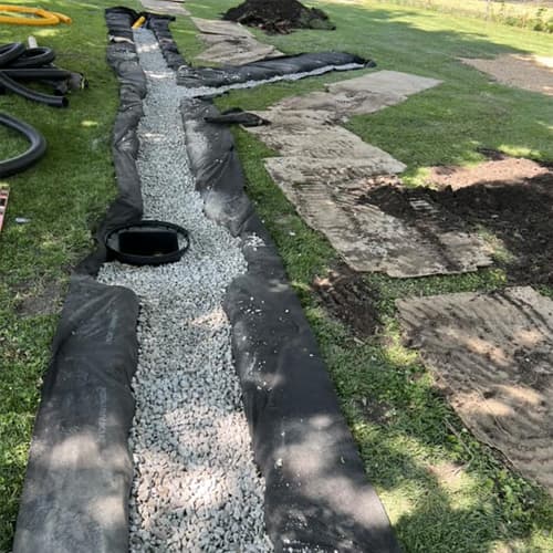 French drain with gravel before covering - Kansas City